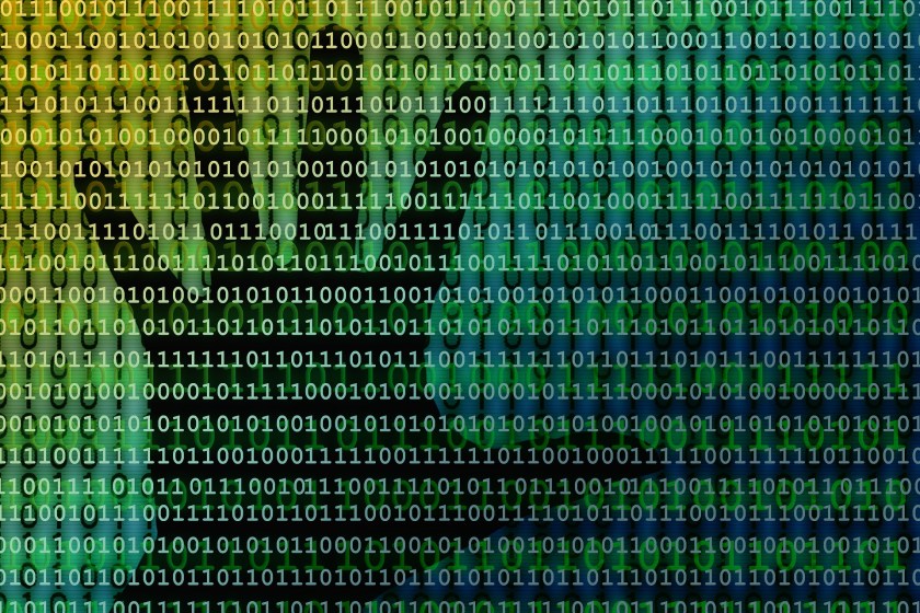 Ykkösiä ja nollia numerorivinä sekä käden kuva